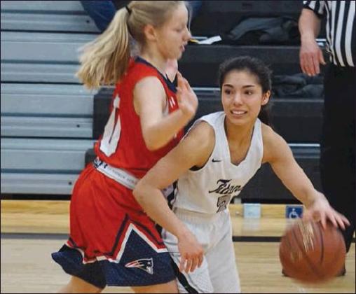 Grace Kertz tries to finda way past the defense in action against MPCG in Drayton last week. VNV Photo by Lyle Van Camp