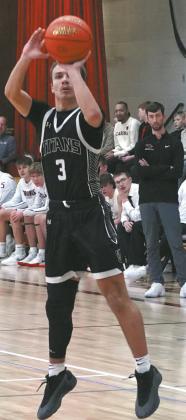 Trenton Keena chipped in seven points in the game against the LEM Cards. Photo by Larry Stokke