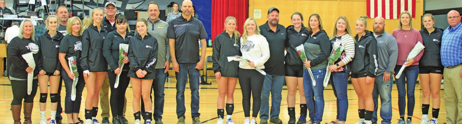 Pictured above left to right: Senior Titan volleyball players and their parents who where honored Saturday afternoon in the Drayton gym. Kim Hannesson, Kendra Hannesson, Troy Hannessson, Jeanette Gimmell, Chloe Gimmell, Ron Gimmell, Lisa Oberg, Hannah Oberg, Steve Oberg, Jamie Oberg, Katelyn Oberg, Mandy Oberg, Mark Hermanson, Maddison Hermanson, Jessica Hermanson, Sondra Verke, Aliyah Bartels, Ryan Bartels, Kerri Stegman, Kasey Stegman, and Wayne Stegman. VNV Photo by Lesa Van Camp
