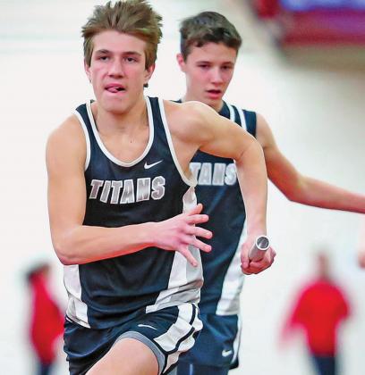 The passing of the baton between Isaac Feltman front and Brady Reilly behind him during a relay at the Cobber Indoor Track Meet. Photo by Cole Short Hillsboro Banner