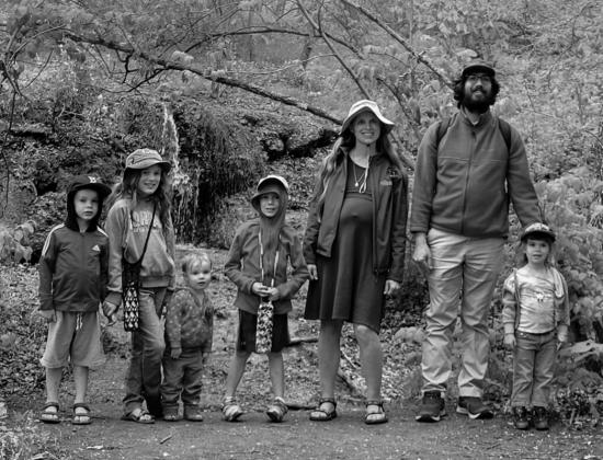 Donald and Tanya Bitzan with their fie children and one on the way were saved by their seatbelts when they went through a roll over accident in their van. NDHHS photo.