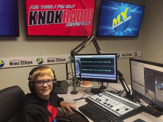 Maxum Mostad being interviewed at Simmons Multimedia Newsroom to spread the word about his haunted house.