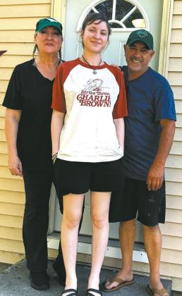 Airbnb owners Paula Chalmers, her husband Tanz and daughter Adelaine. Photo by Christine Jensen
