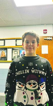 Gavin Cole in his ugly Christmas sweater Friday evening at the basketball game. Photo from Lauri Logsdon.