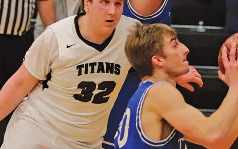 Lukas Pastorek guards one of the Hatton Northwood Thunder players in the last regular season game in Drayton last week. VNV Photo by Lesa Van Camp