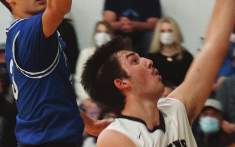 Tyson Backer puts up a shot in action last Friday in Drayton. VNV photo by Lyle Van Camp