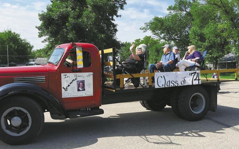 The class of 1974 dedicated their float to a lost classmate at the St. Thomas Daze parade. Photo by Kathryn Sisk