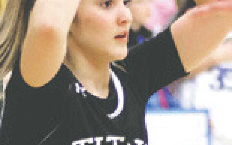 Jacey Nelson looks for an open teammate in the play-in game last Friday. Photo by Lyle Van Camp.