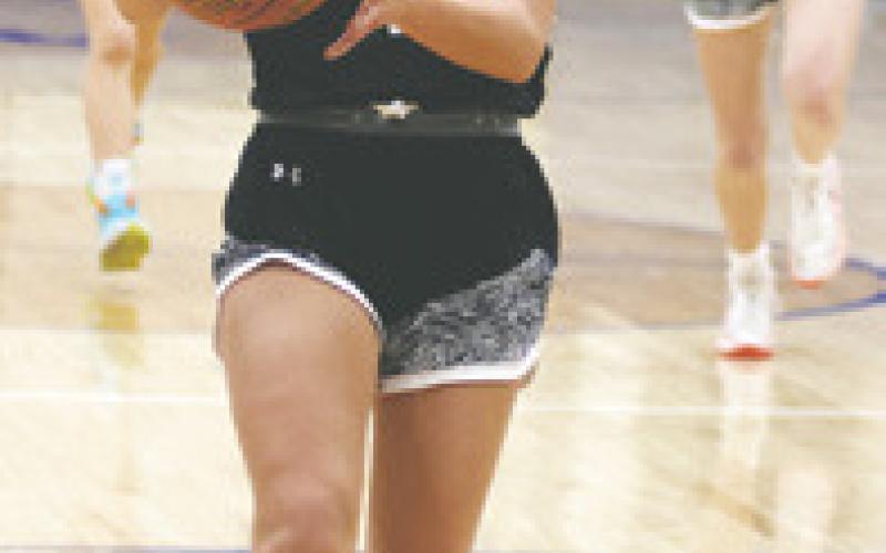 Brooke Gullickson drives the lane at Hillsboro. Photo by Lyle Van Camp.