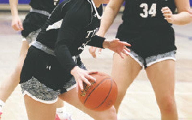 Aleah Pokrzywinski drives the lane at H-CV. Photo by Lyle Van Camp.