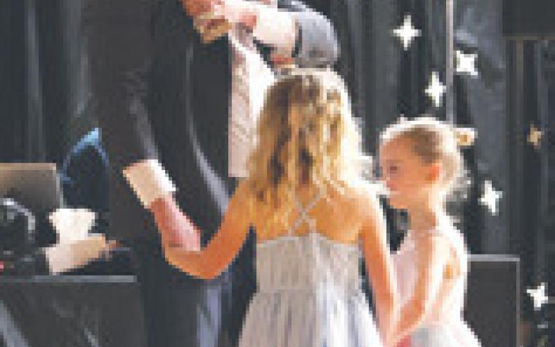 Millie, Dan, Evie and Lauren Hillier dancing after the grand march. Photo by Lyle Van Camp.