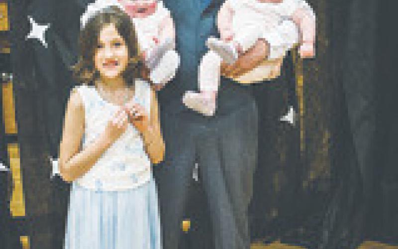 Daidralynn, J-Lee, and Elizabeth with their father Matt Manley. Photo by Lyle Van Camp.
