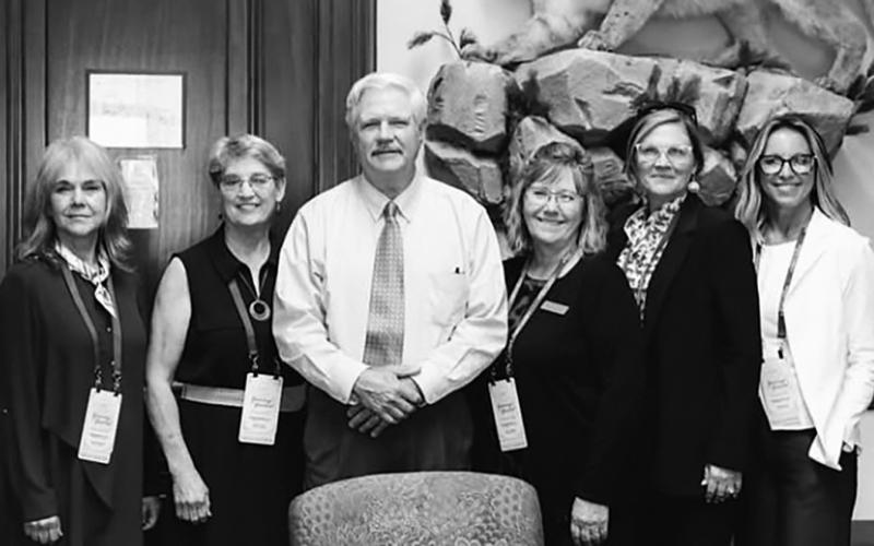 Senator Hoeven with ND CWA Members. Photo by Linda Thorson.