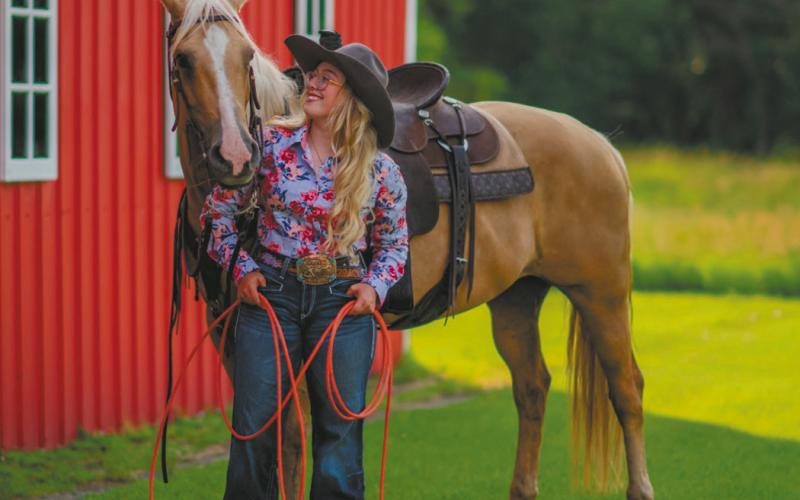 Sophia Wilson, posed with her beloved horse, Chica for her senior pictures. Submitted photo