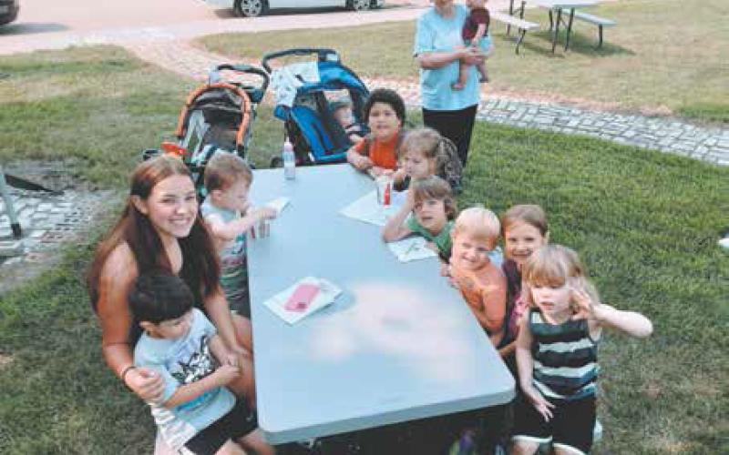 Daniellia Pokrzywinski, Director of Big Hearts Daycare in Drayton, brought her group to the Blessing Museum &amp;amp; Square for free floats, rock painting, chips, hotdogs, coin scramble, and much more. Big Hearts opened in October and plans to make this field trip an annual event. Photo by Duane H.H. Lyon