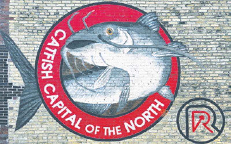 Drayton’s new water tower will be embellished with the Catfish Capital’s logo, matching this mural on Main Street. Photo by Hilary Nowatzki.