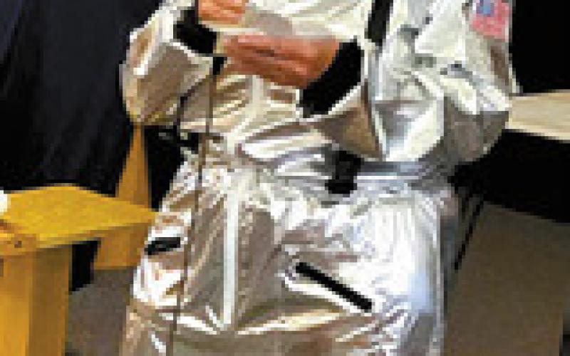Glenda Erickson AKA astronaut ‘Sandy Dunes’ visiting with the children at VBS. Photo by Cindy Johnson.