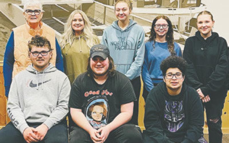YOUNG EMPLOYEES STEP UP TO THE PLATE, literally, while Hastings Landing manager recovers