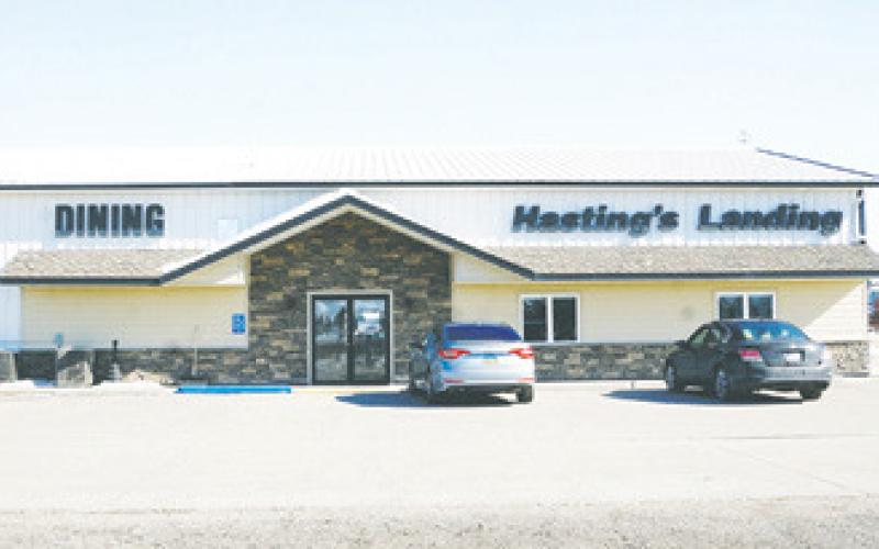 YOUNG EMPLOYEES STEP UP TO THE PLATE, literally, while Hastings Landing manager recovers