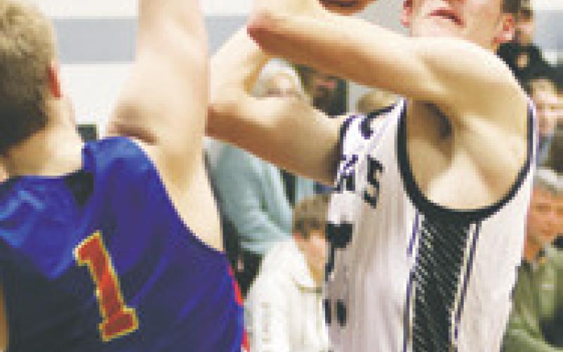 Everett Fedje tries to shoot through the Benson County defense. Photo by Lyle Van Camp.