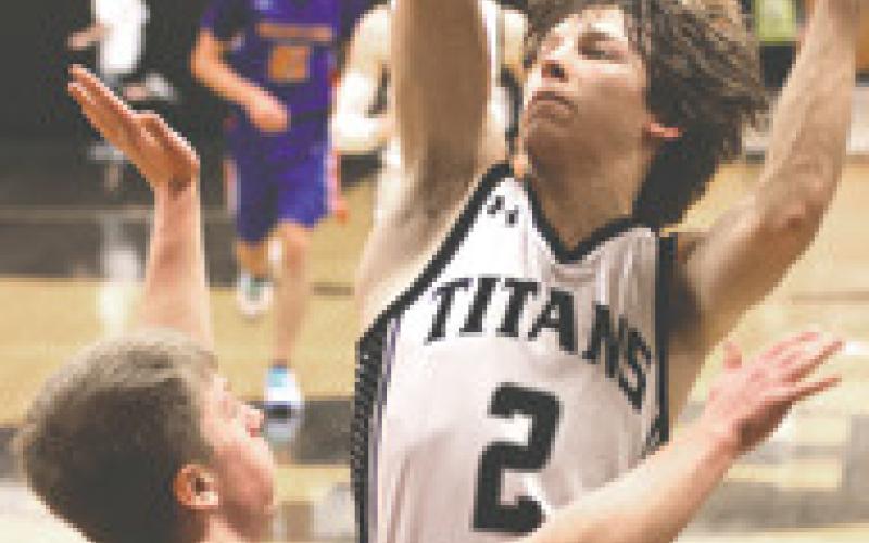 Logan Wieler puts up a shot in action against Benson County. Photo by Lyle Van Camp.
