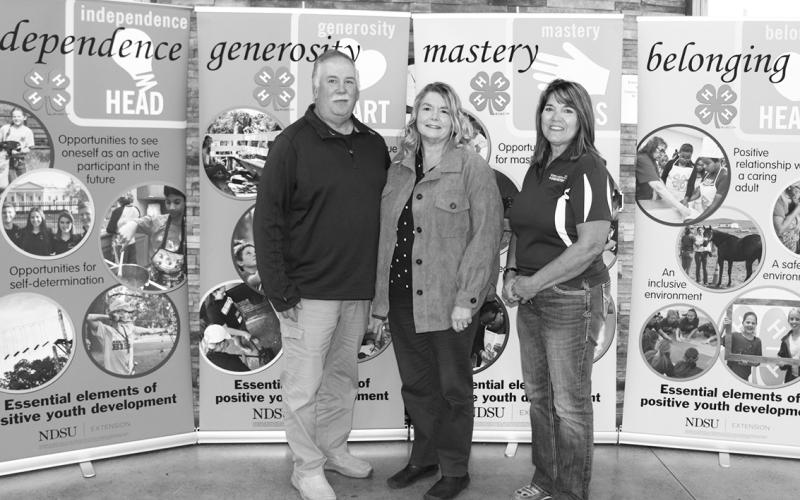 The Nelson family is recognized as a North Dakota 4-H Century Family. Pictured from left: Brent Nelson; Becky Nelson and Becky Peterson, North Dakota 4-H Foundation chair. (NDSU photo)