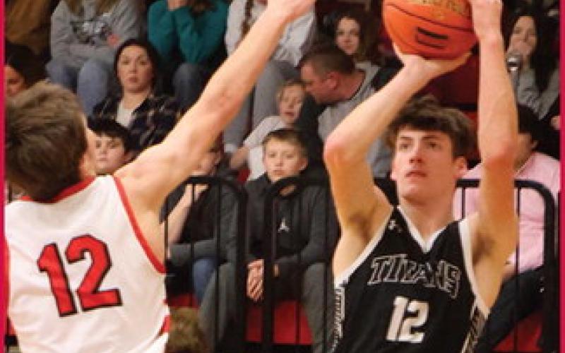 Everett Fedje shoots over North Star's Hunter Hagler.