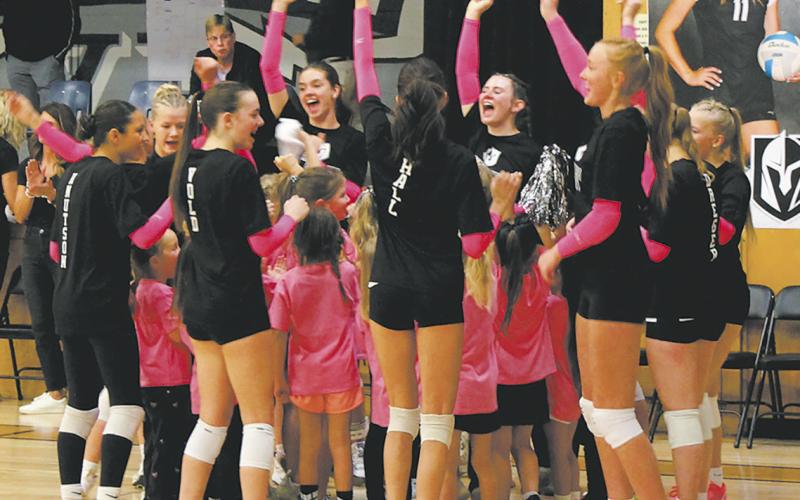 DVE Tiny Titans joined the varsity squad in a cheer before Friday's volleyball game. Photo by Jamie Rarick.