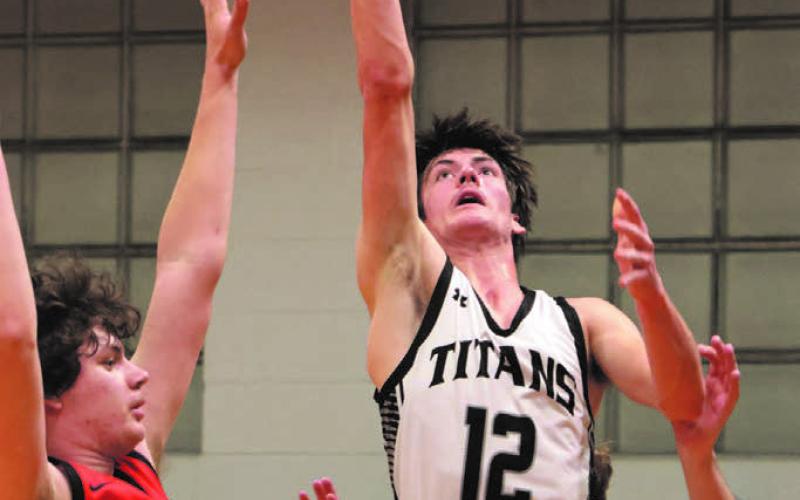 Everett Fedje shoots through a crowd in action against North Star.