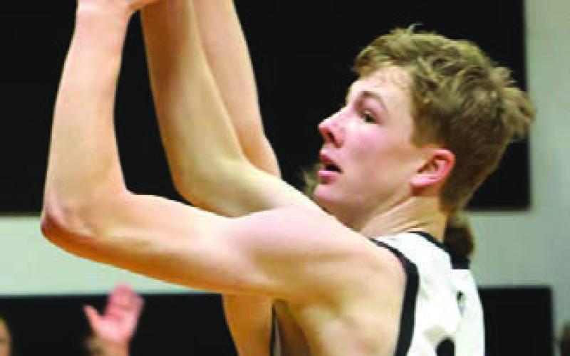 Jack Langerud has his shot blocked by a North Star defender in Crystal last week.