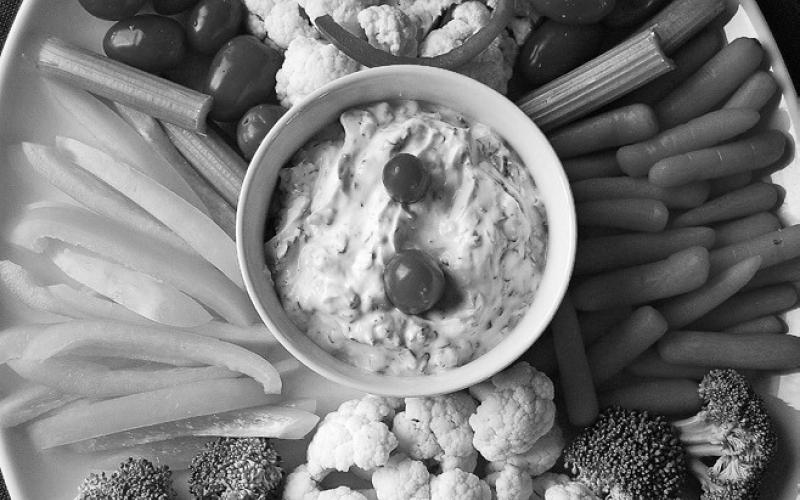 This snowman veggie platter makes a great contribution to a holiday potluck. (NDSU photo)