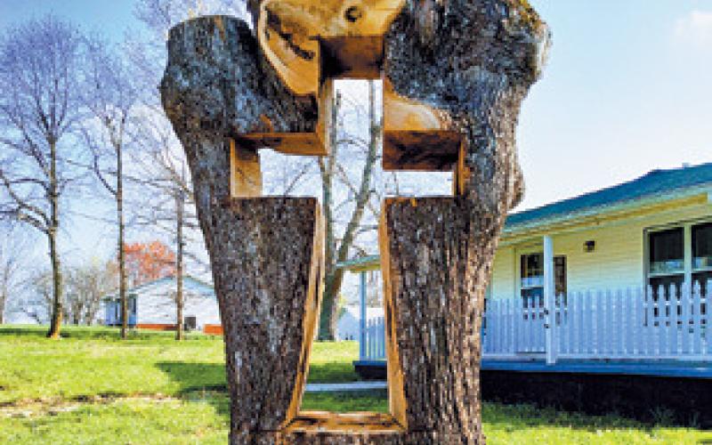 This tree fell on a home in Tennessee during a recent storm. Afterwards, the tree was trimmed and left for Easter. Photo by Duane H.H. Lyon.