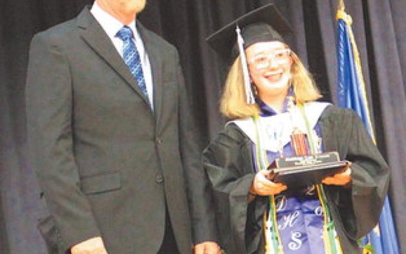 Valedictorian, Siobhan Kissee Diploma presented by Mark Hatloy. Photo by Andrea Johnston.