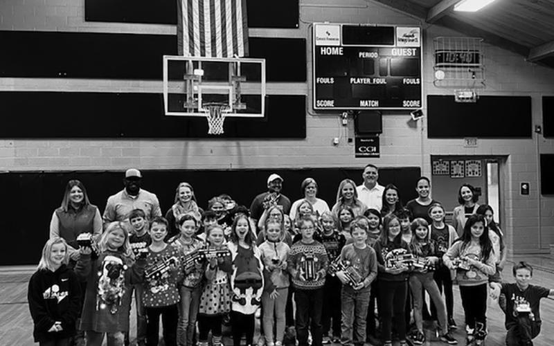 Hess donates toy trucks to elementary schools in North Dakota
