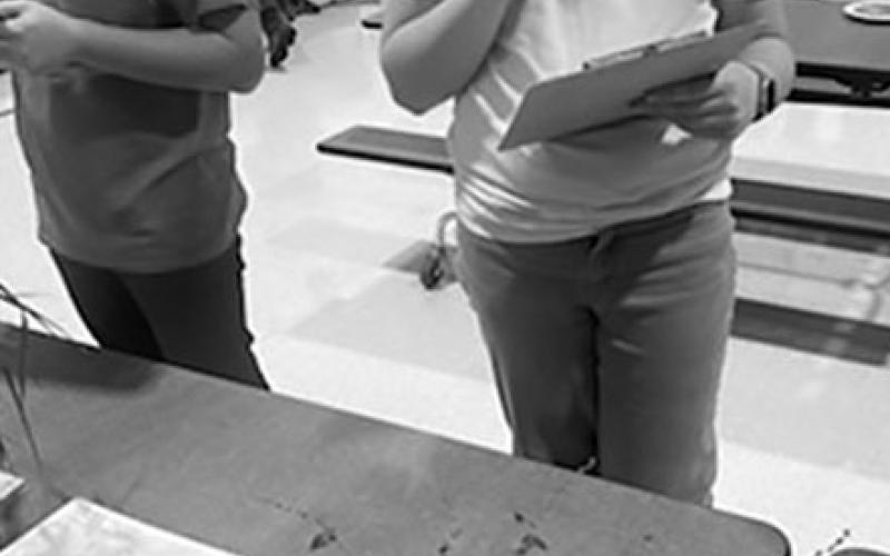 Naomi Stegman identifies live plants. Submitted photo
