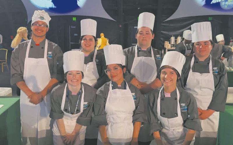 Jerimiah Johnson and his teammates from Ringgold High School prepare to compete in the Cook Around the World competition. Photo by Yvonne Johnson.