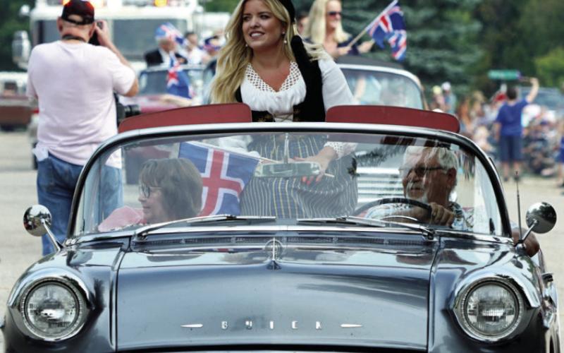 Her Excellency Áslaug Arna Sigurbjörnsdóttir, Iceland’s Minister of Higher Education, Science, and Innovation, riding in the parade on Saturday before her keynote speech. Photo by Larry Stokke