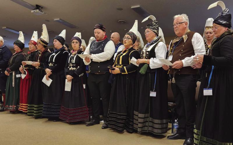 The Annriki group sings the Icelandic National Anthem in preparation of their fashion show and heritage program. Photo by Hilary Nowatzki.