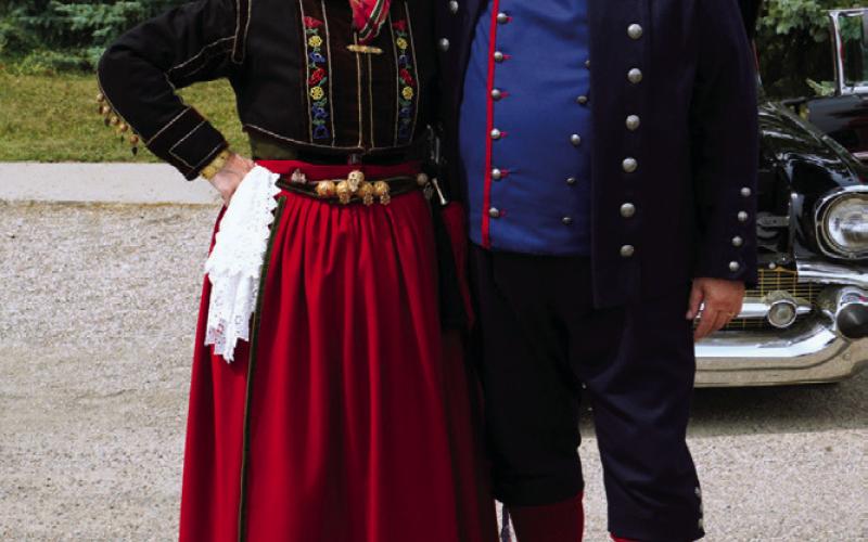 Icelanders dressed in traditional garb -handmade by the Annriki group pose for photos on Saturday. Photos by Larry Stokke.