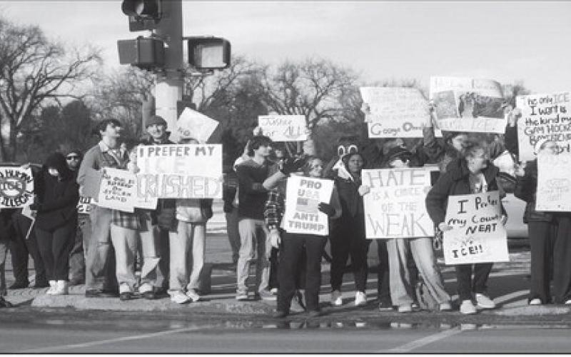 Demonstrators stand in front of the North Dakota Capitol in Bismarck on Jan. 11, 2026, during an ICE Out for Good rally in response to the killing of Renee Good by Immigration and Customs Enforcement agent Jonathan Ross in Minnesota. Photo by Kyle Martin/For the North Dakota Monitor