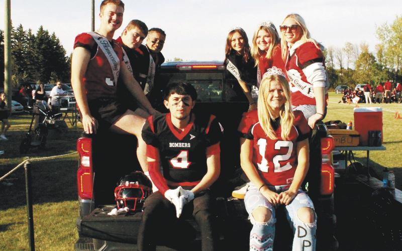 Members of the homecoming court rode along the sidelines during halftime of Saturday's game. Pictured: (On gate: King Trypp Castillo, Queen Alyssa Hoyles Back from left: Junior Attendant Maddox Oihus, Jaxon Wilson, Jerimiah Johnson, Taylor Hermanson, Alyvia Quibell, Junior Attendant Hope Patterson.) Photo by Jamie Rarick