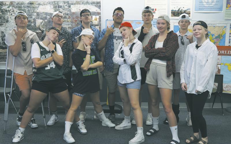 The senior class dressed for Frat Boy Day. (Back: Hunter Johnson, JJ Knudson, Ian Peterson, Daniel De Souza, Quinn Passa, Drew Passa Front: Aleah Pokrzywinski, Reese Fering, Rylee Maurstad, Easton Larson, Ellie Haltom. Photo by Jamie Rarick