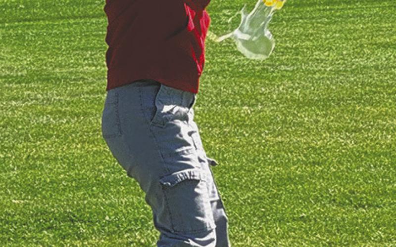 Kennedy Staskivige has her egg exploded in the fi nal round of the egg toss. She and Jonah Rarick fi nished second. Photo by Lyle Van Camp