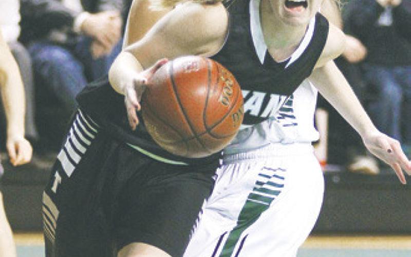While in contention for the championship round while facing the Titans’ continual nemesis at the time, Thompson, Laiken Larson wound up with the ball in the Tommies end of the court. Cornered by two Thompson defenders, everything fell into place for a near perfect photo.