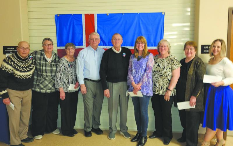 Representatives accepting Heritage Site grants: L-R John H. Johnson (Gardar Pioneer church), Michelle Murray (Svold Hall), Karen Kristjanson (Thingvalla Cemetery), Kayo Vivatson (Vidalin), Gerald Christianson (Borg Memorial Home), Sharon Laxdal (Gardar Lutheran), Karen Langerud (Gardar Township Hall), Barb Mahar (NENDHA for Akra Hall) and Dori Heck (Vikur LCW).