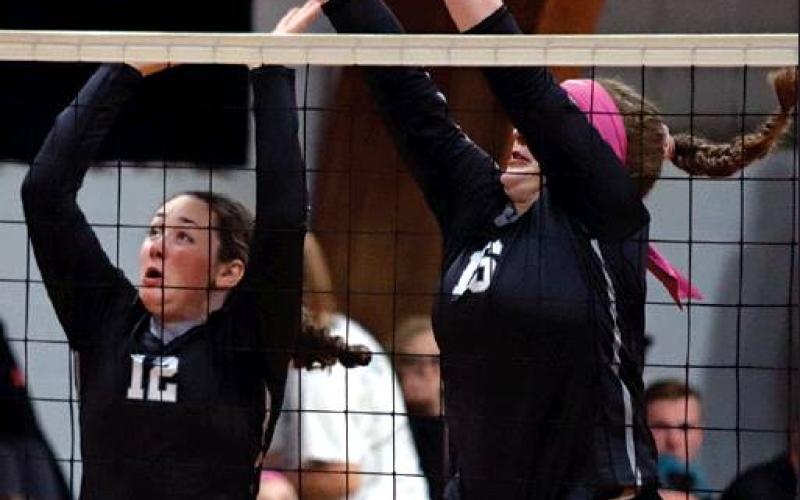 Madison Hermanson and Maria Myrdal go up for the block against the Grafton Spoilers last Thursday in Crystal. VNV Photo by Lesa Van Camp
