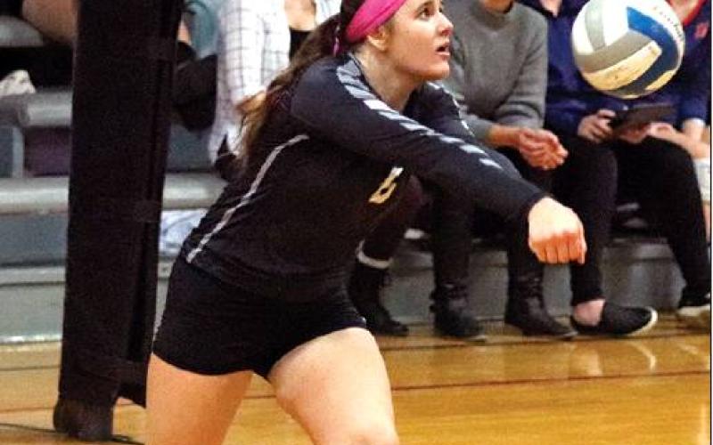 Kaylee Pastorek bumps the ball during the matchup against the Spartans Monday night in Crystal. More pictures from Monday nights game and Senior night next week in VNV. VNV Photo by Lesa Van Camp