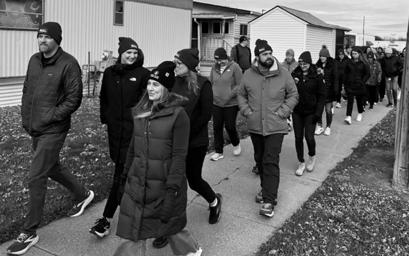 Members of the Bismarck community participate in a “Walk a Mile in My Shoes” event on Nov. 18, tracing a route many homeless people take during the daytime when no shelters are open in the capitol. The event was put on by the Missouri Slope Areawide United Way. Photo, Michael Standaert.