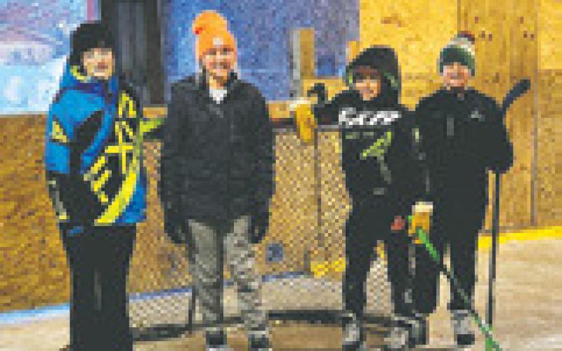 Hailey Uggerud, Reegan Aasand, Rylan Nore, and Jaxon Woinarowicz enjoyed some time on the ice after school on Monday, Jan. 9. Photo by Hilary Nowatzki.
