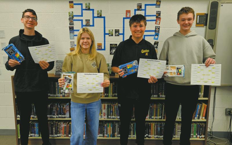 In the month of Mch,ar the Drayton High School Library put on a 'Best Bracket' contest, with students and staff voting on their favorite books after filling out brackets with their predicted results. The competition was tough, but the overall choice for best book was The Outsiders, by S.E. Hinton. Winners of the bracket contest are pictured as follows: Jonah, Alyssa, Hunter, and Chey. Thank you to everyone who participated and congratulations to the winners!